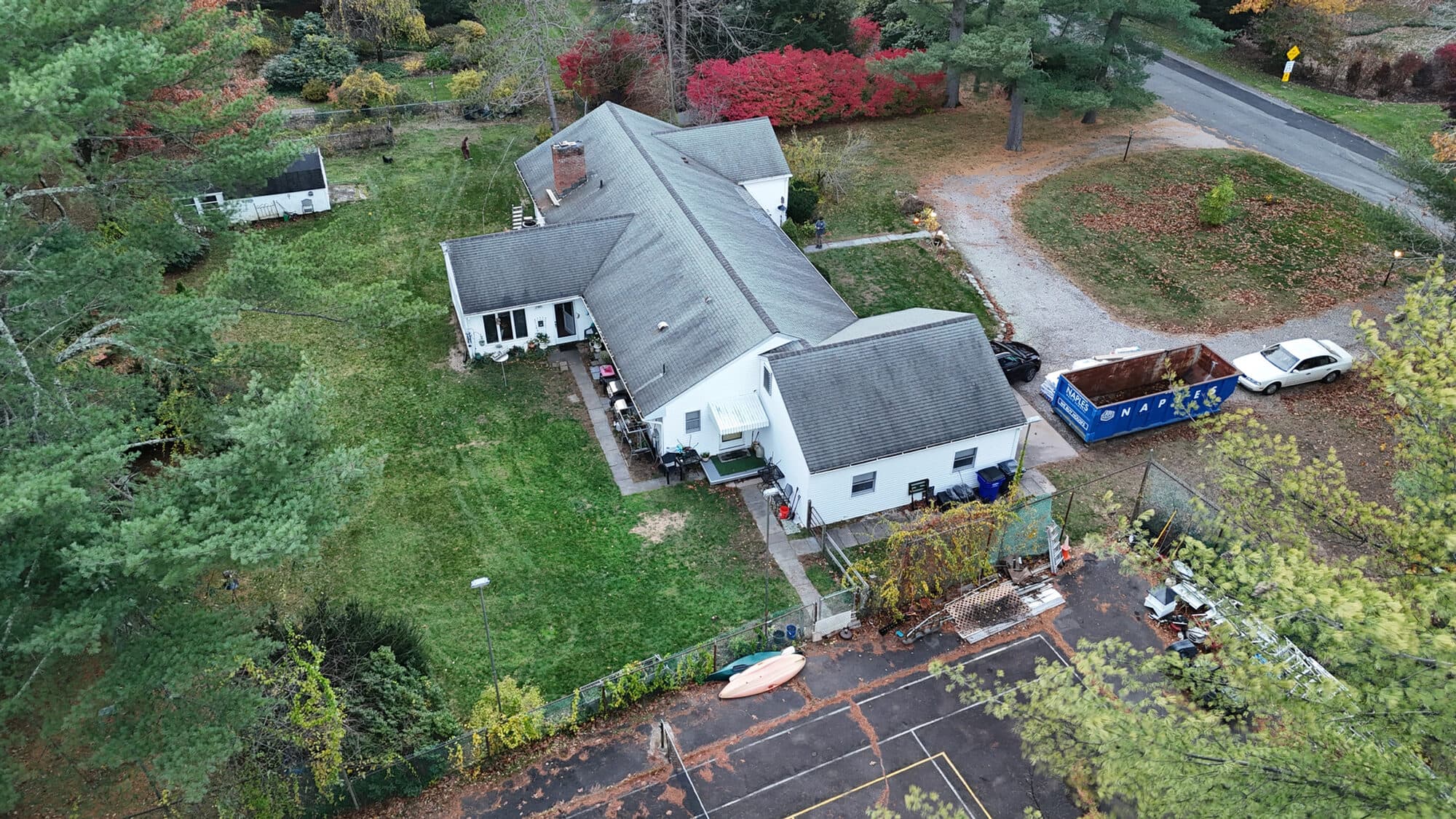 Connecticut home exterior showing replacement windows and an entry door