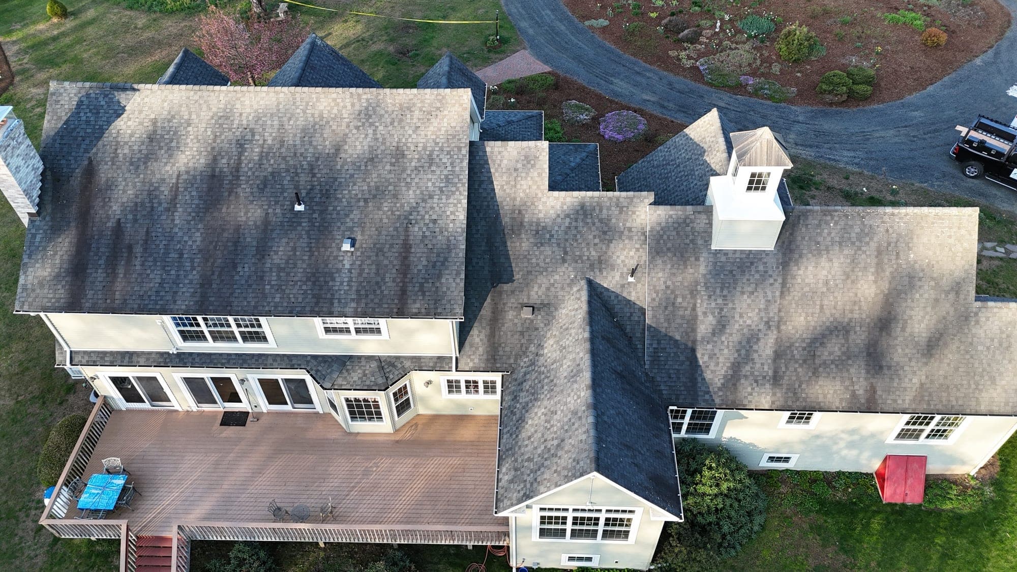 Aerial view of a storm-worn Connecticut roof before repair