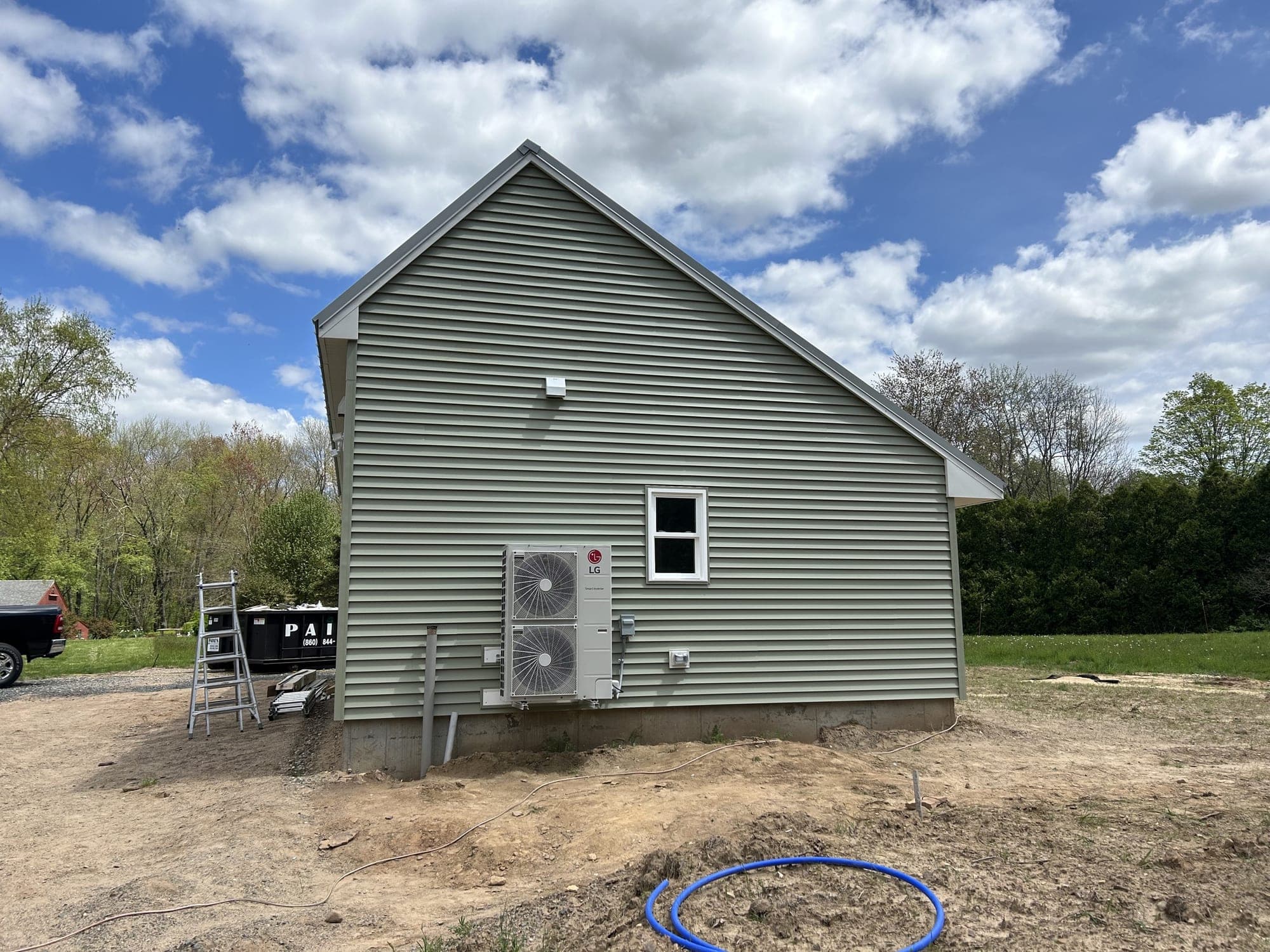 Finished vinyl siding and gutter system on a Central Connecticut home